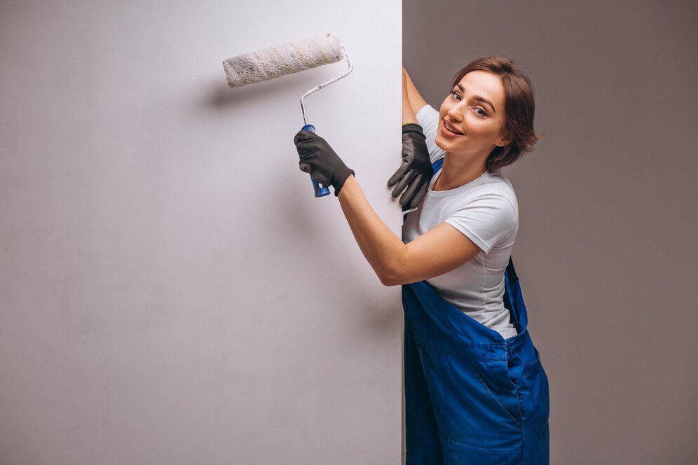 woman repairer with painting roller isolated 1303 14146