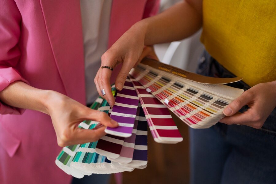 Exterior Painting Services 21 side view women testing colours 23 2150538660