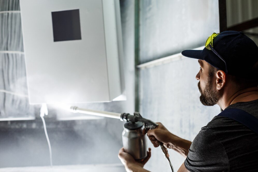 Exterior Painting Services 25 worker painting detail with air spray pistol 176420 4734